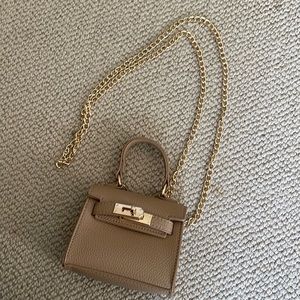 Little brown purse with gold accents